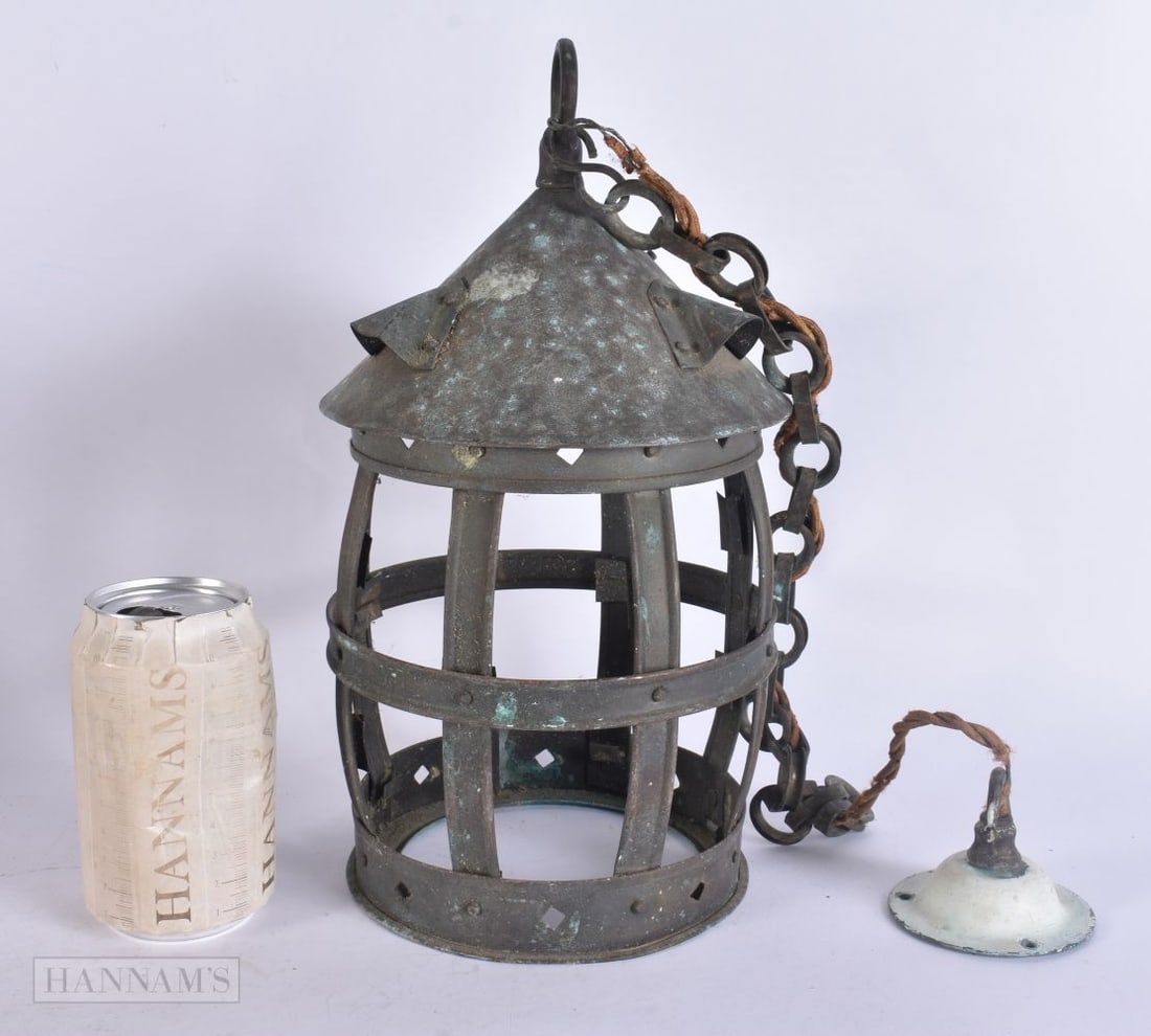 A COPPER HANGING LANTERN. 30 cm high excluding chain.: A COPPER HANGING LANTERN. 30 cm high excluding chain.