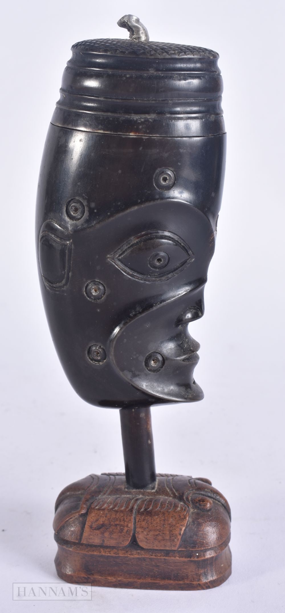 AN UNUSUAL EARLY 20TH CENTURY TRIBAL HORN VESTA STRIKER upon a carved wood base. 17 cm high. (1 of 6)