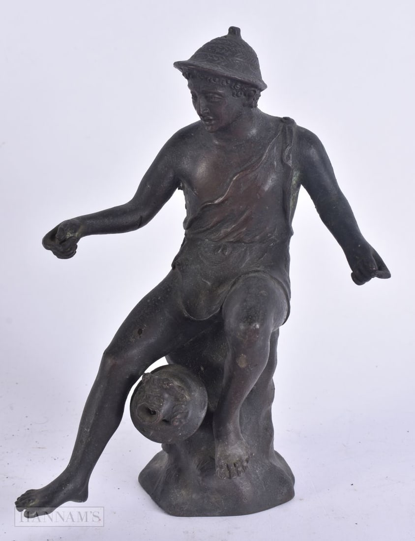 A 19TH CENTURY GRAND TOUR BRONZE FIGURE OF A NEAPOLITAN FISHERMAN modelled upon a naturalistic base.: A 19TH CENTURY GRAND TOUR BRONZE FIGURE OF A NEAPOLITAN FISHERMAN modelled upon a naturalistic base. 21 cm high.