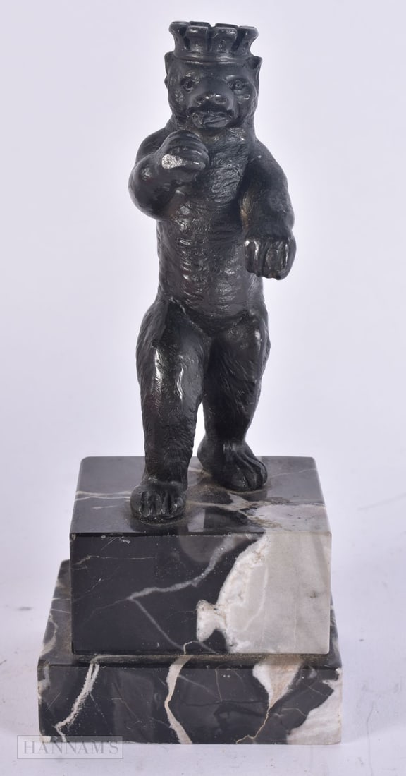 AN ART DECO BRONZE FIGURE OF A CROWNED BEAR. 16.5 cm high. (1 of 6)