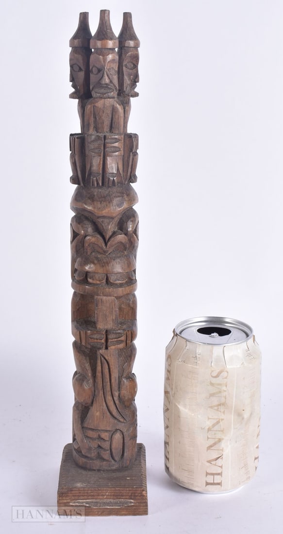 A NORTH AMERICAN HAIDA CARVED WOOD TOTEM POLE. 32 cm high. (1 of 6)