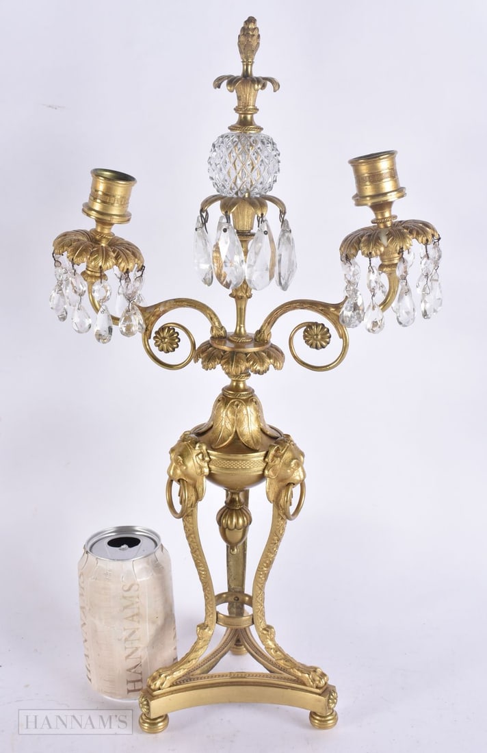 A LATE 19TH CENTURY FRENCH GILT BRONZE CANDELABRA GLASS LUSTRE formed with lion mask heads. 48 cm x: A LATE 19TH CENTURY FRENCH GILT BRONZE CANDELABRA GLASS LUSTRE formed with lion mask heads. 48 cm x 24 cm.