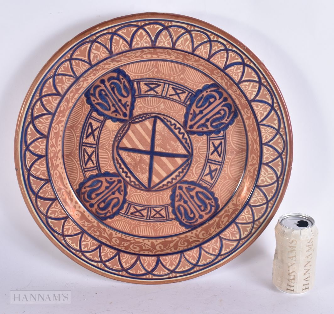 A LARGE 19TH CENTURY HISPANO MORESQUE LUSTRE DISH painted with motifs. 40 cm wide. (1 of 4)