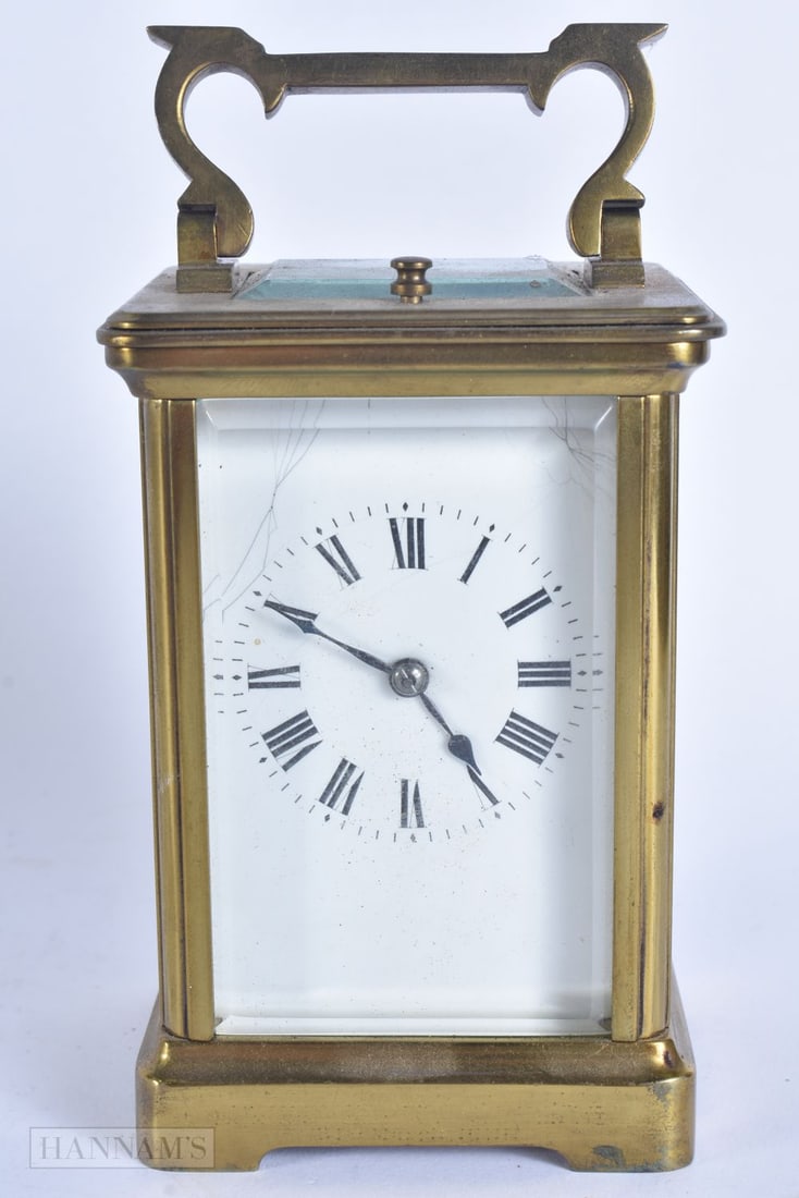 A FRENCH BRASS REPEATING CARRIAGE CLOCK. Working. 15.5 cm high inc handle. (1 of 7)