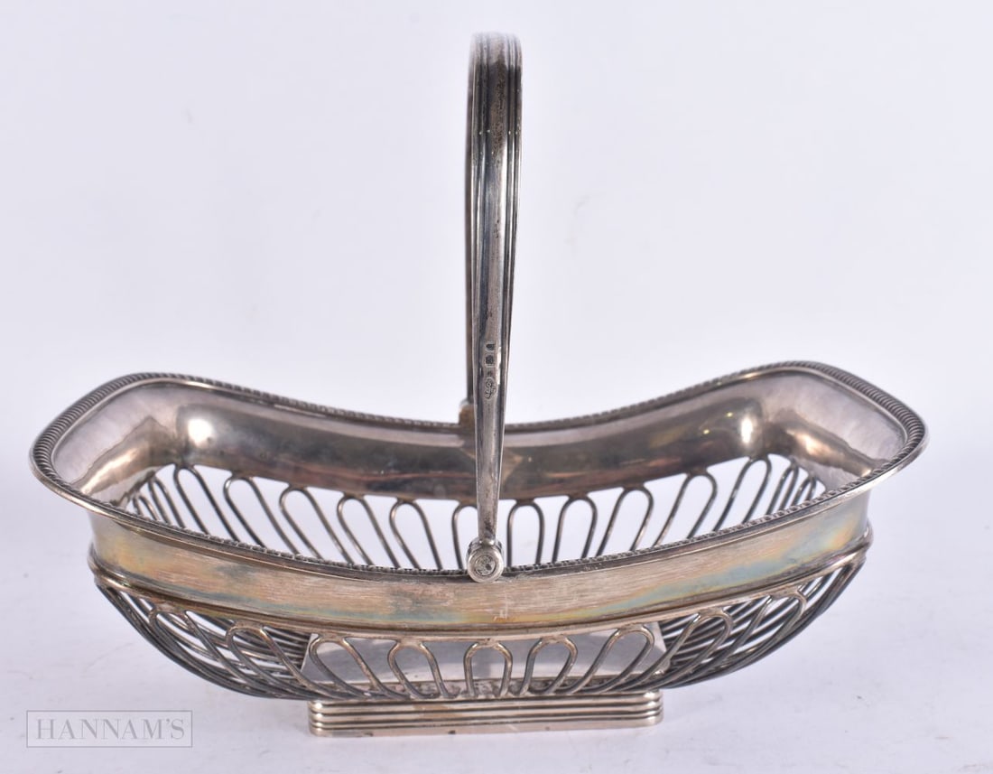AN ANTIQUE SILVER BASKET. 664 grams. 23 cm x 18 cm inc handle. (1 of 7)
