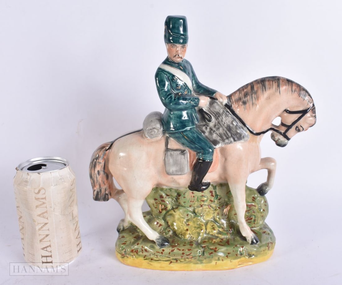 A VICTORIAN STAFFORDSHIRE FIGURE OF A MALE ON HORSEBACK. 27 cm x 20 cm. (1 of 6)