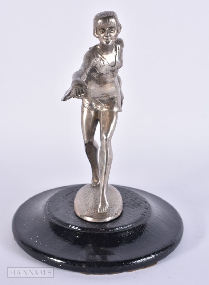 A 1920S DUTCH DANCING GIRL CAR MASCOT by J Aland. 19.5 cm high. (1 of 5)