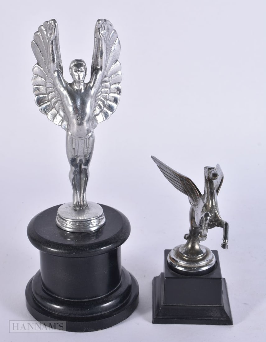 AN ICARUS CAR MASCOT together with a Pegasus mascot. Largest 23.5 cm high. (2) (1 of 5)