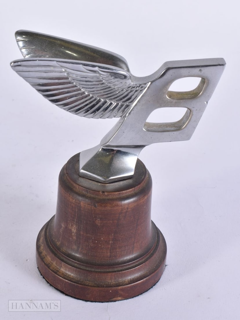 A BENTLEY 'FLYING B' CAR MASCOT. 12 cm high. (1 of 4)
