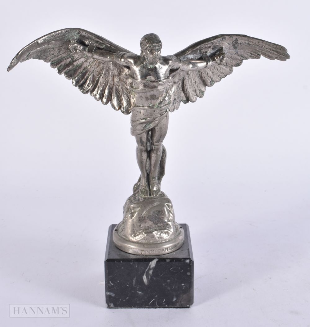 AN ICARUS CAR MASCOT retailed by Finnigans of London. 22 cm x 17 cm. (1 of 6)