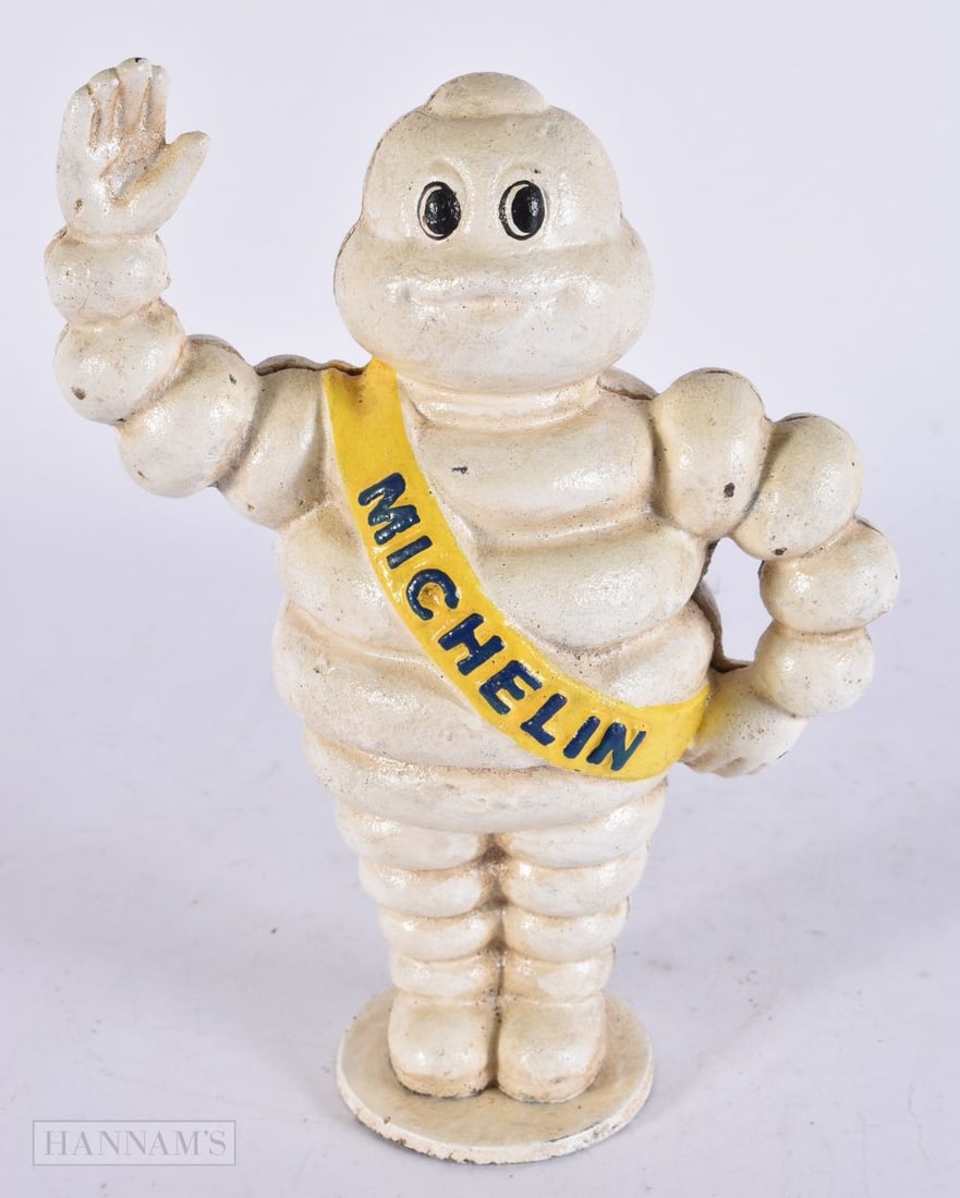 A MICHELIN MAN MONEY BANK. 22 cm high. (1 of 5)