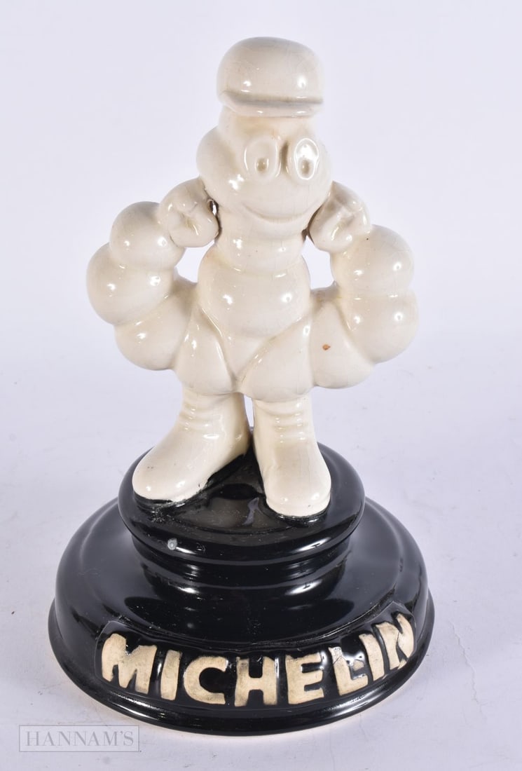 A CERAMIC MICHELIN MAN ADVERTISING FIGURE. 26 cm x 12 cm. (1 of 5)