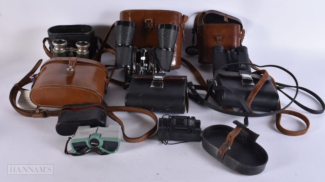 A BOX OF BINOCULARS. (qty) (1 of 4)