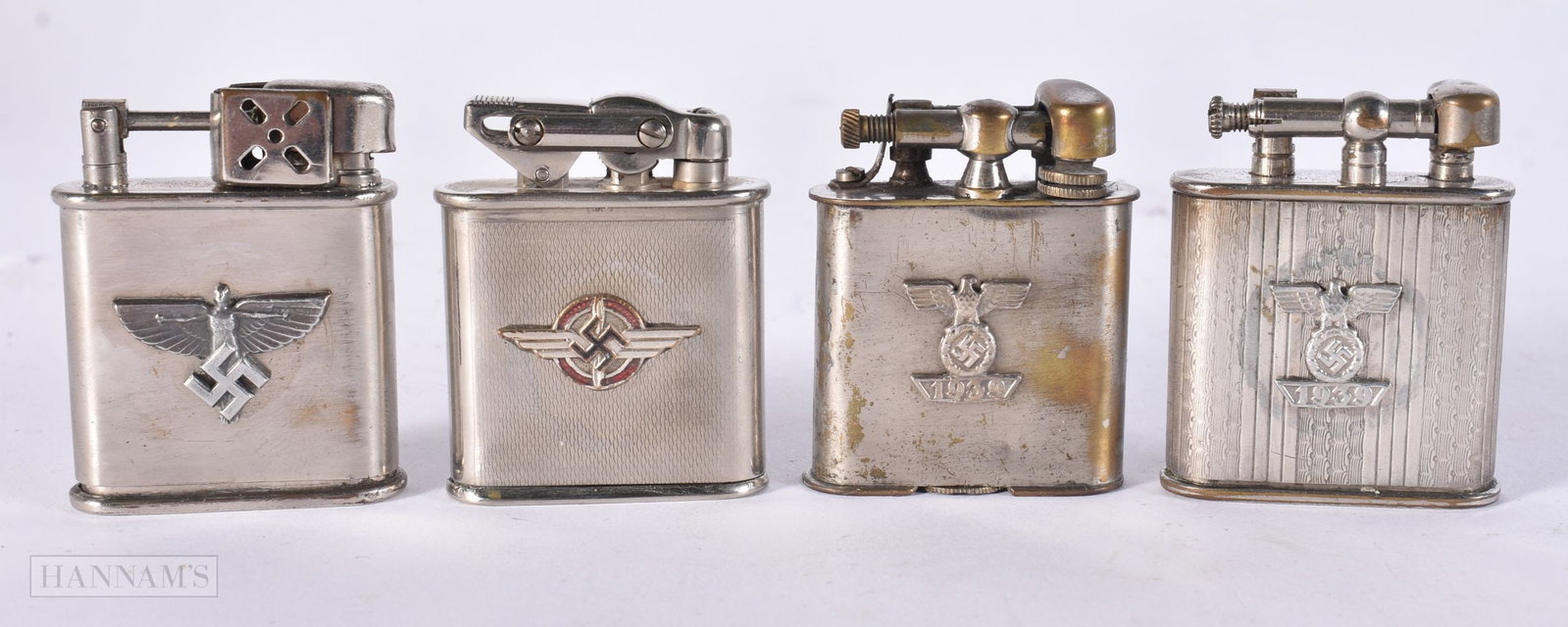 FOUR GERMAN WWII LIGHTERS. (4) (1 of 3)