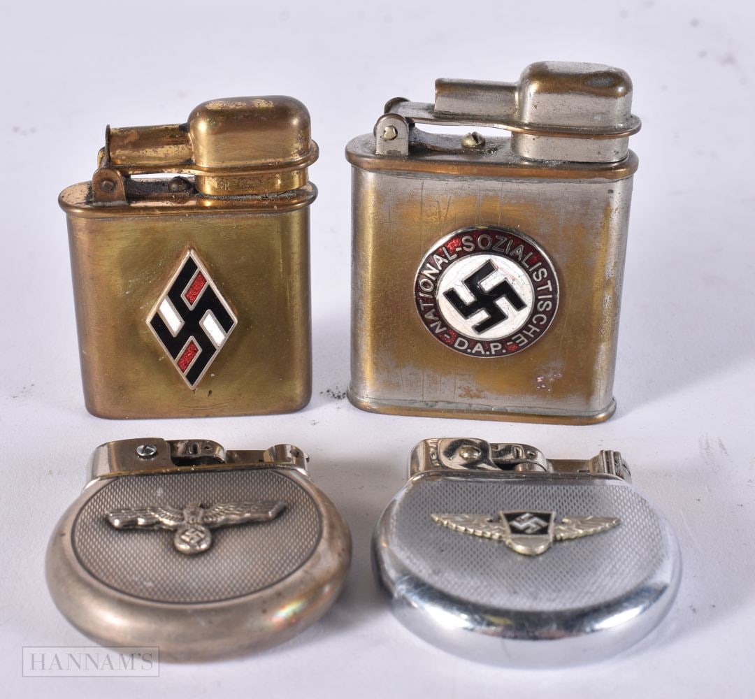 FOUR GERMAN WWII LIGHTERS including two enamelled examples. (4) (1 of 4)