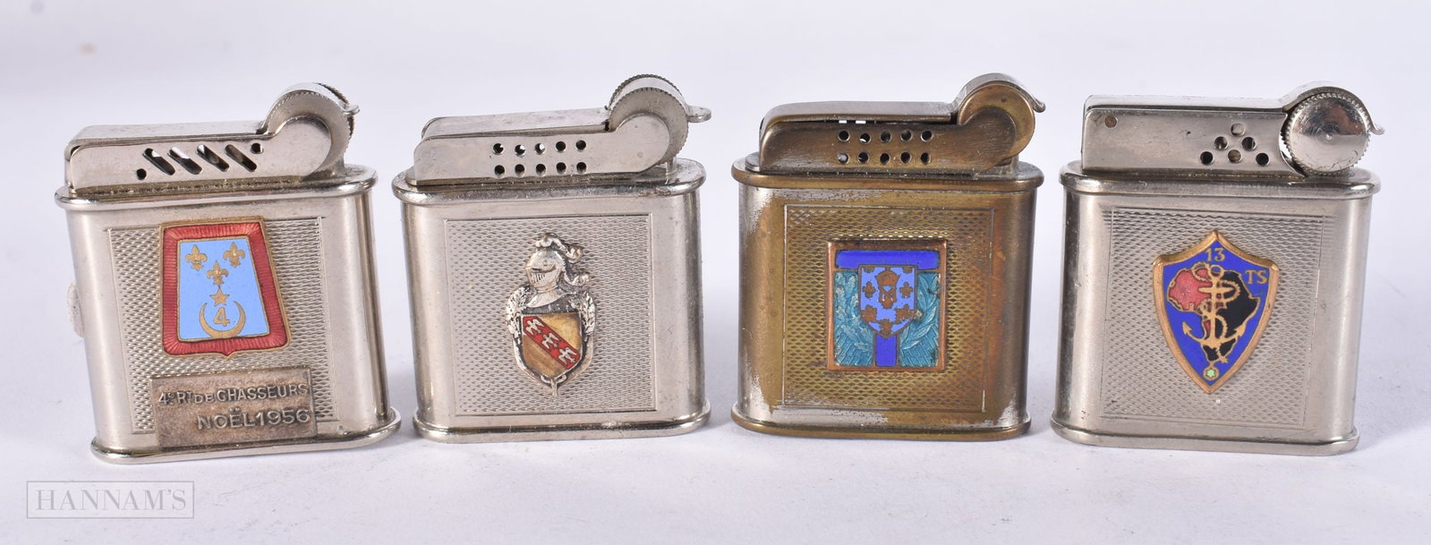 FOUR FRENCH PARIS ENAMELLED ARMORIAL DRAGO LIGHTERS. (4) (1 of 3)