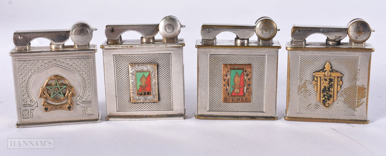 FOUR FRENCH PARIS ENAMELLED DRAGO LIGHTERS. (4): FOUR FRENCH PARIS ENAMELLED DRAGO LIGHTERS. (4)