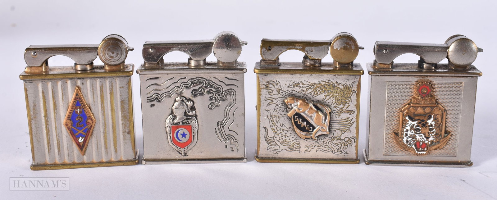FOUR FRENCH PARIS ENAMELLED DRAGO LIGHTERS. (4): FOUR FRENCH PARIS ENAMELLED DRAGO LIGHTERS. (4)