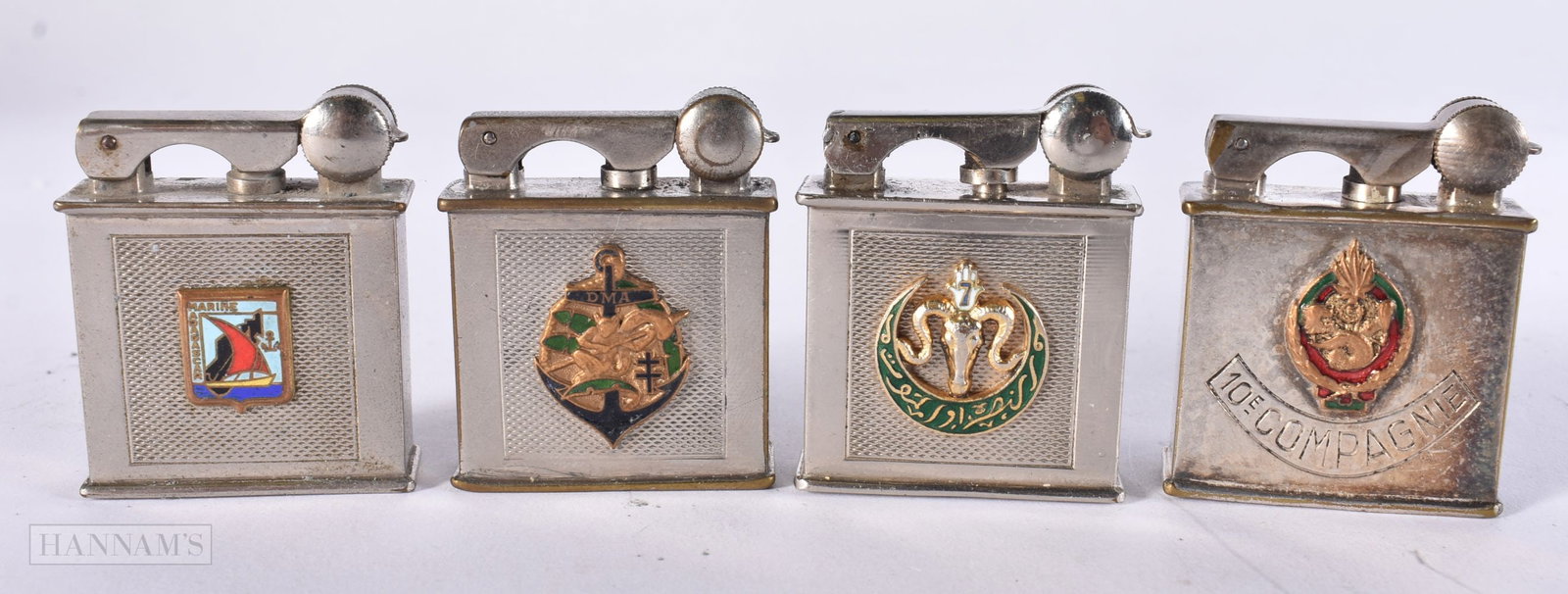 FOUR FRENCH PARIS ENAMELLED DRAGO LIGHTERS. (4): FOUR FRENCH PARIS ENAMELLED DRAGO LIGHTERS. (4)