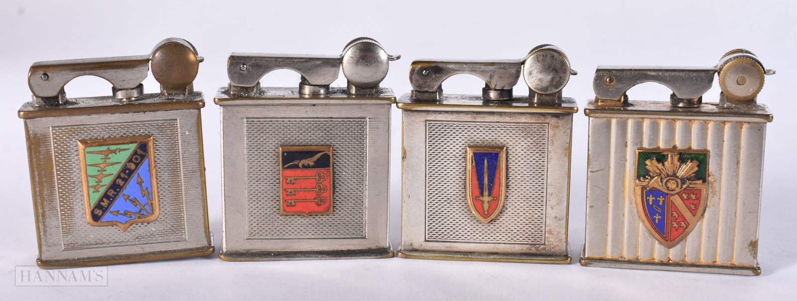 FOUR FRENCH PARIS ENAMELLED DRAGO LIGHTERS. (4): FOUR FRENCH PARIS ENAMELLED DRAGO LIGHTERS. (4)