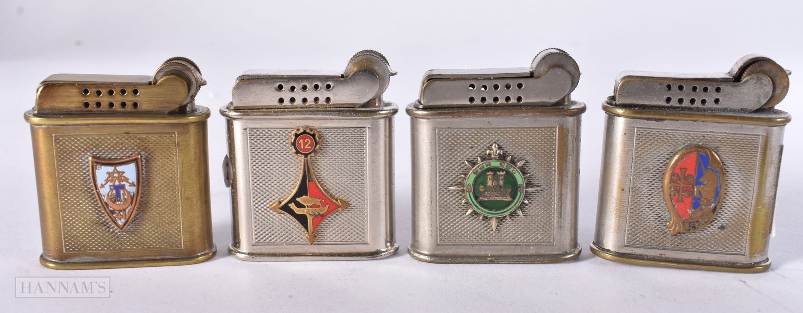 FOUR FRENCH PARIS ENAMELLED DRAGO LIGHTERS. (4): FOUR FRENCH PARIS ENAMELLED DRAGO LIGHTERS. (4)
