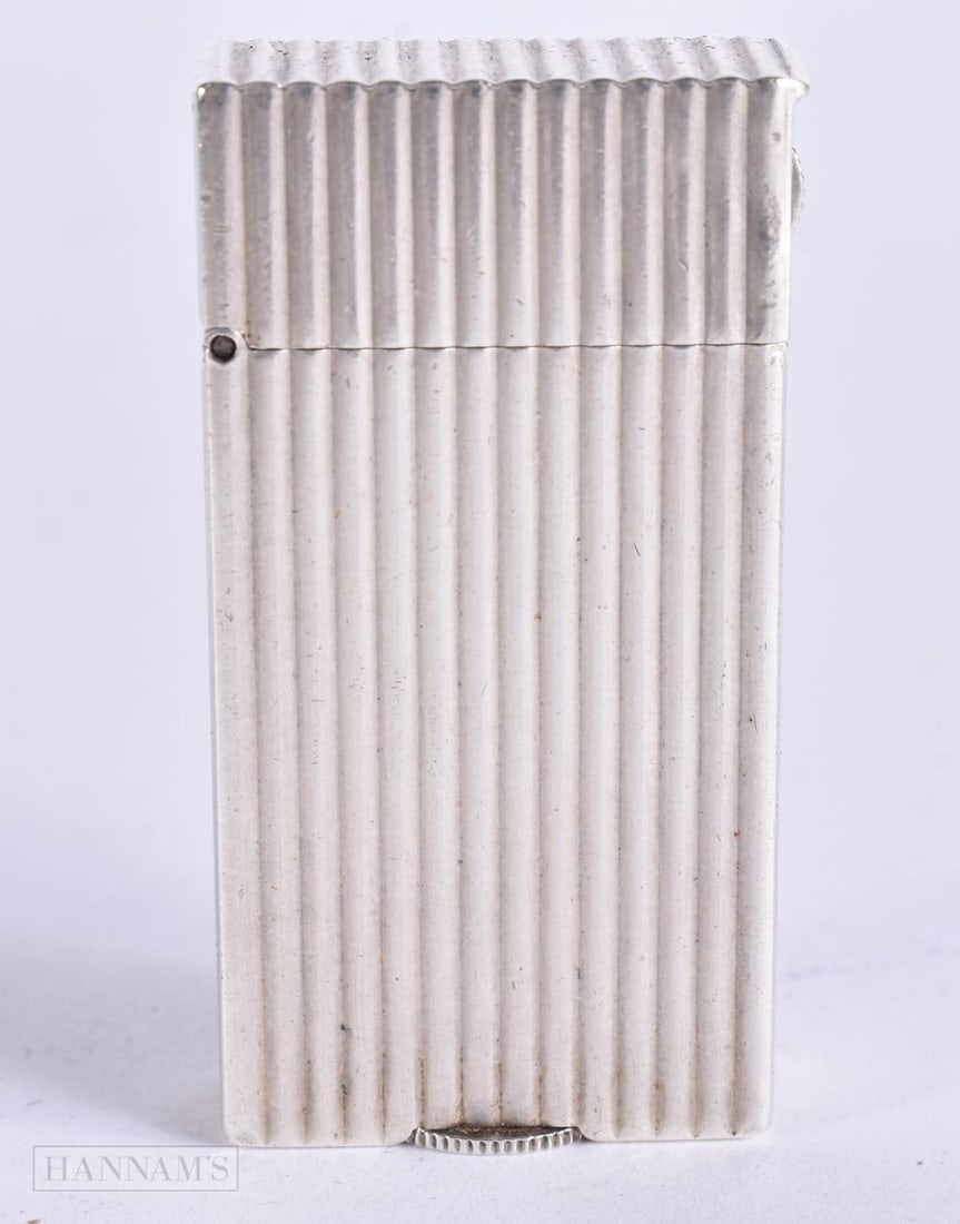 AN ART DECO FRENCH HERMES SILVER LIGHTER. 5.5 cm high. (1 of 4)