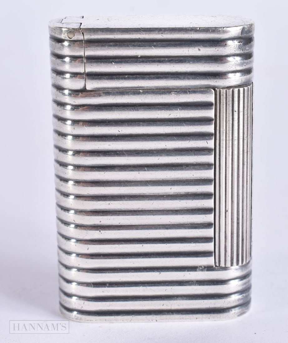 AN ART DECO FRENCH VCA SILVER LIGHTER. 4.75 cm high. (1 of 3)