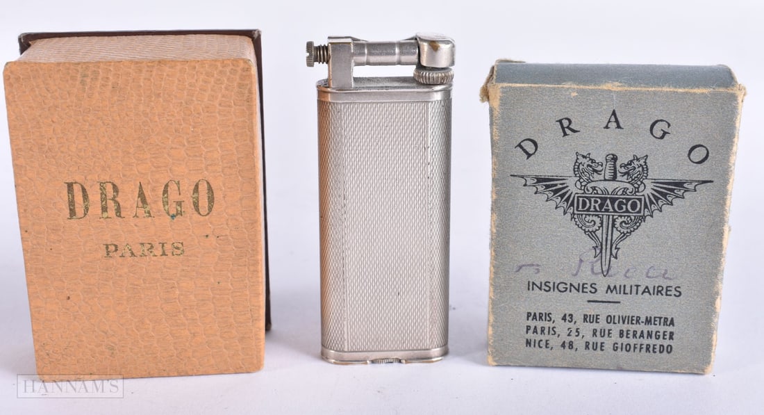 A DUNHILL LIGHTER and two Drago lighter boxes. (3) (1 of 3)