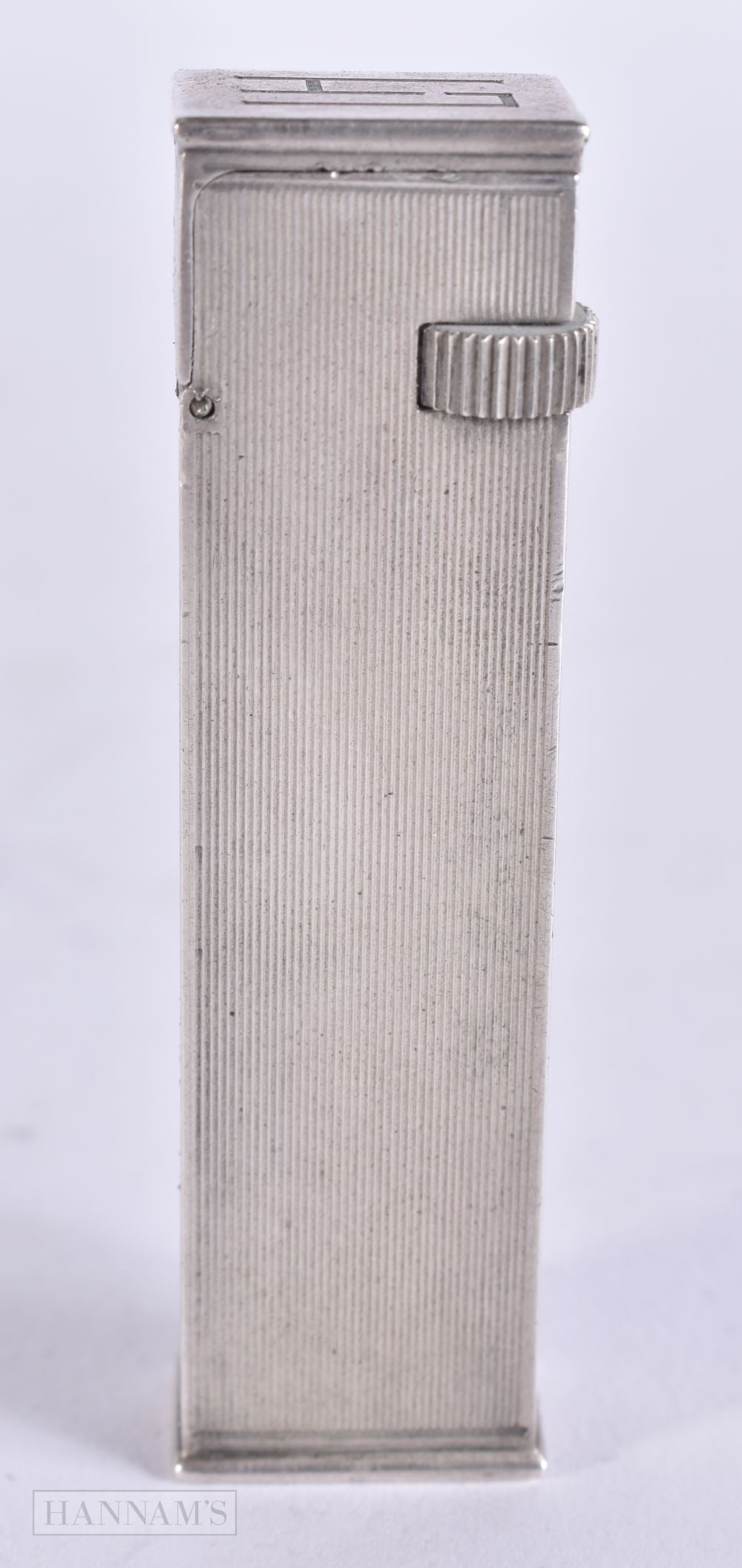 AN ART DECO DUNHILL SILVER LIGHTER. 6.25 cm high.: AN ART DECO DUNHILL SILVER LIGHTER. 6.25 cm high.
