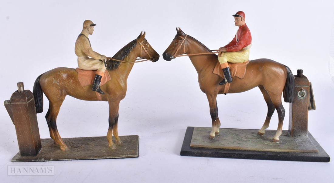 A PAIR OF ART DECO EQUESTRIAN COLD PAINTED SPELTER LIGHTERS. 18 cm x 18 cm. (1 of 4)