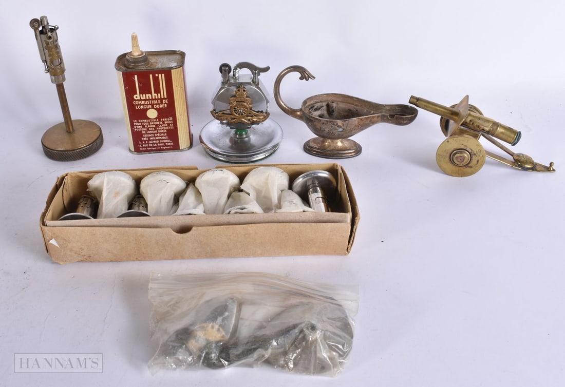 A DUNHILL GENIE LAMP LIGHTER together with another military style cannon lighter etc. (5) (1 of 11)