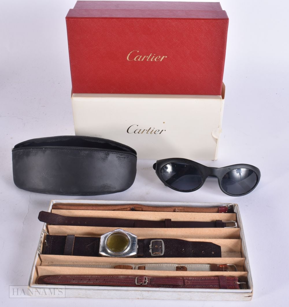 A BOXED PAIR OF CARTIER SUNGLASSES together with watch straps etc. (qty) (1 of 5)