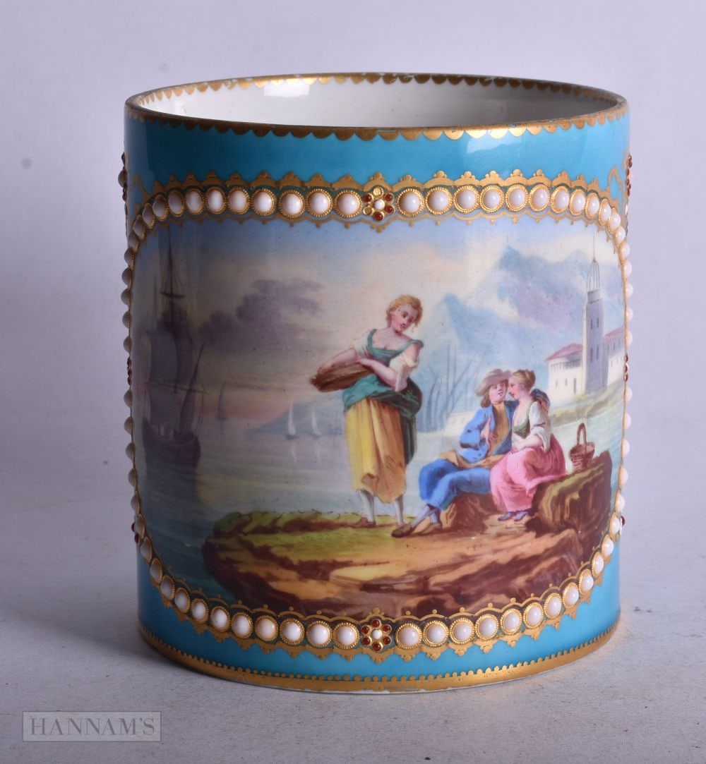 Sevres fine mug painted with a sailing scene and three people sitting on a rock, the centre panel wh (1 of 5)