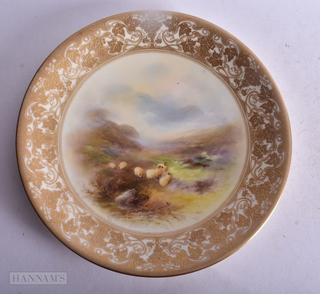 Royal Worcester fine plate with raised elaborate gilding painted with a loch & landscape with six sh: Royal Worcester fine plate with raised elaborate gilding painted with a loch & landscape with six sheep, by Harry Davis, signed date 1911, 23 cm diameter ,