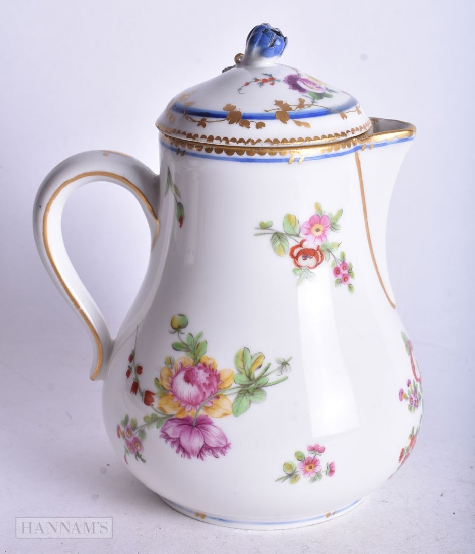 Paris porcelain jug and cover painted with bouquets and sprigs under a blue line and dental gilding, (1 of 4)