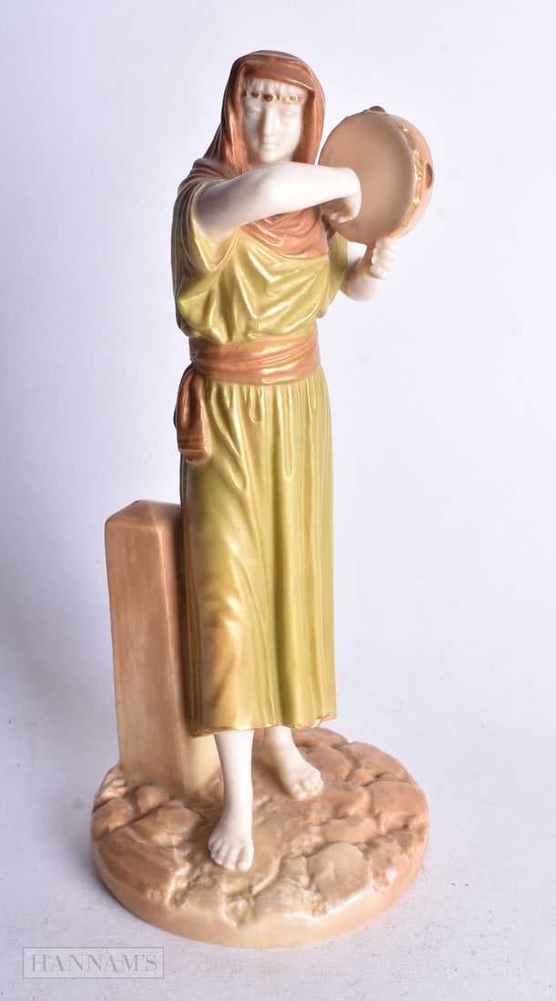Royal Worcester figure woman decorated in two tone gold with a tambourine in her hand standing besid (1 of 4)