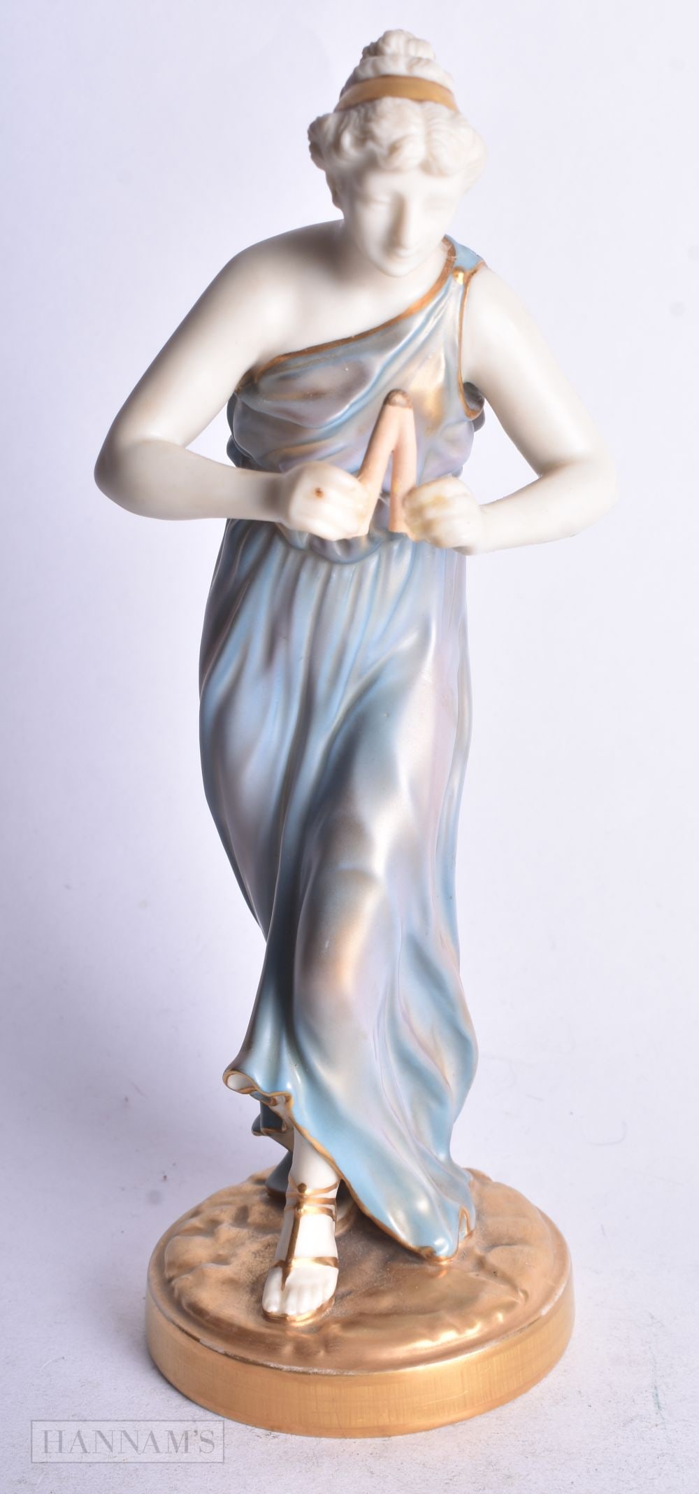 Royal Worcester figure of a dancing Maiden, modelled by James Hadley, date mark for 1928, shape no 1: Royal Worcester figure of a dancing Maiden, modelled by James Hadley, date mark for 1928, shape no 1828. 21 cm high (damage to pipes)