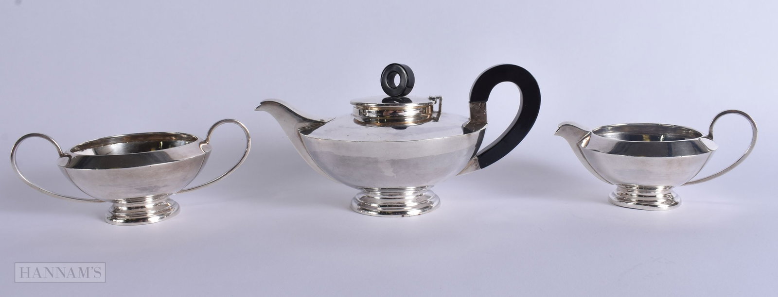 AN ART DECO SILVER TEASET. 728 grams. Largest 18.5 cm wide. (3) (1 of 6)