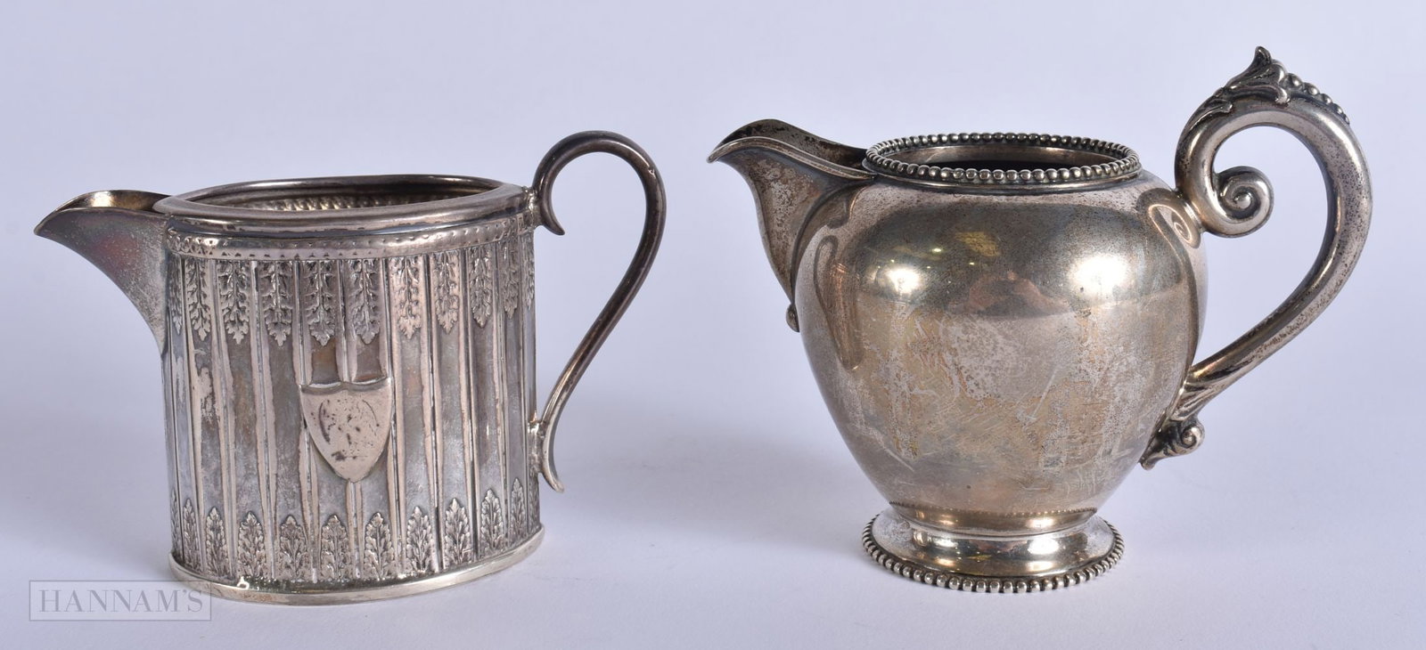 TWO ANTIQUE SILVER CREAM JUGS. 200 grams. 9 cm wide. (2) (1 of 5)