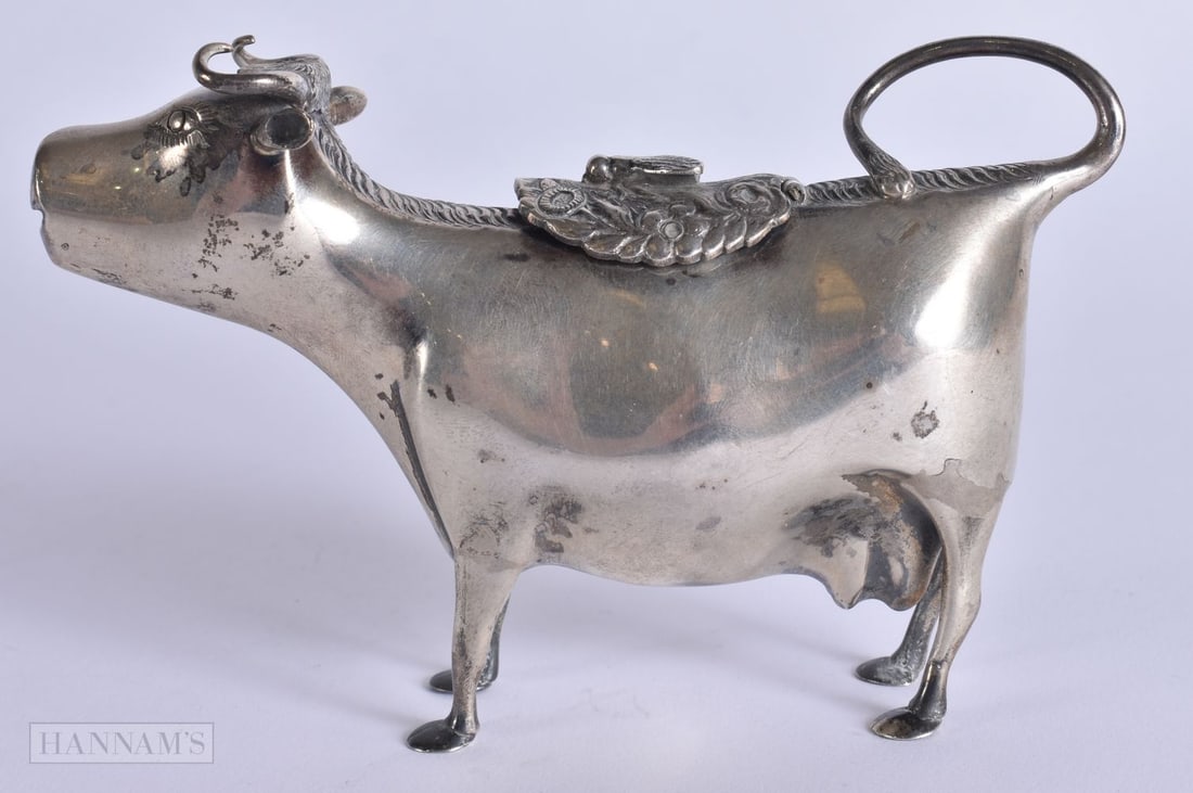 AN ANTIQUE CONTINENTAL SILVER COW CREAMER. 134 grams. 14 cm wide. (1 of 5)