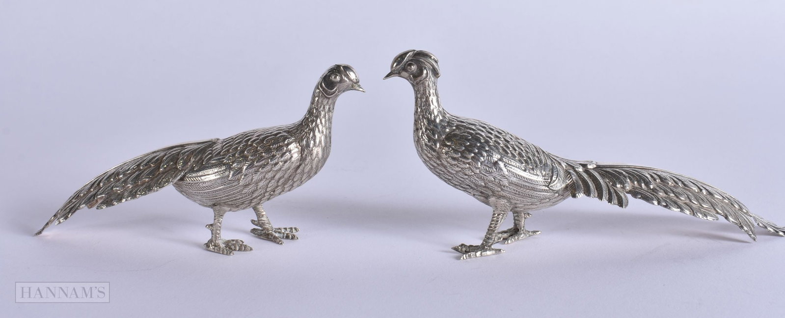 A PAIR OF CONTINENTAL SILVER GAME BIRDS. 60 grams. 11.5 cm wide. (1 of 5)
