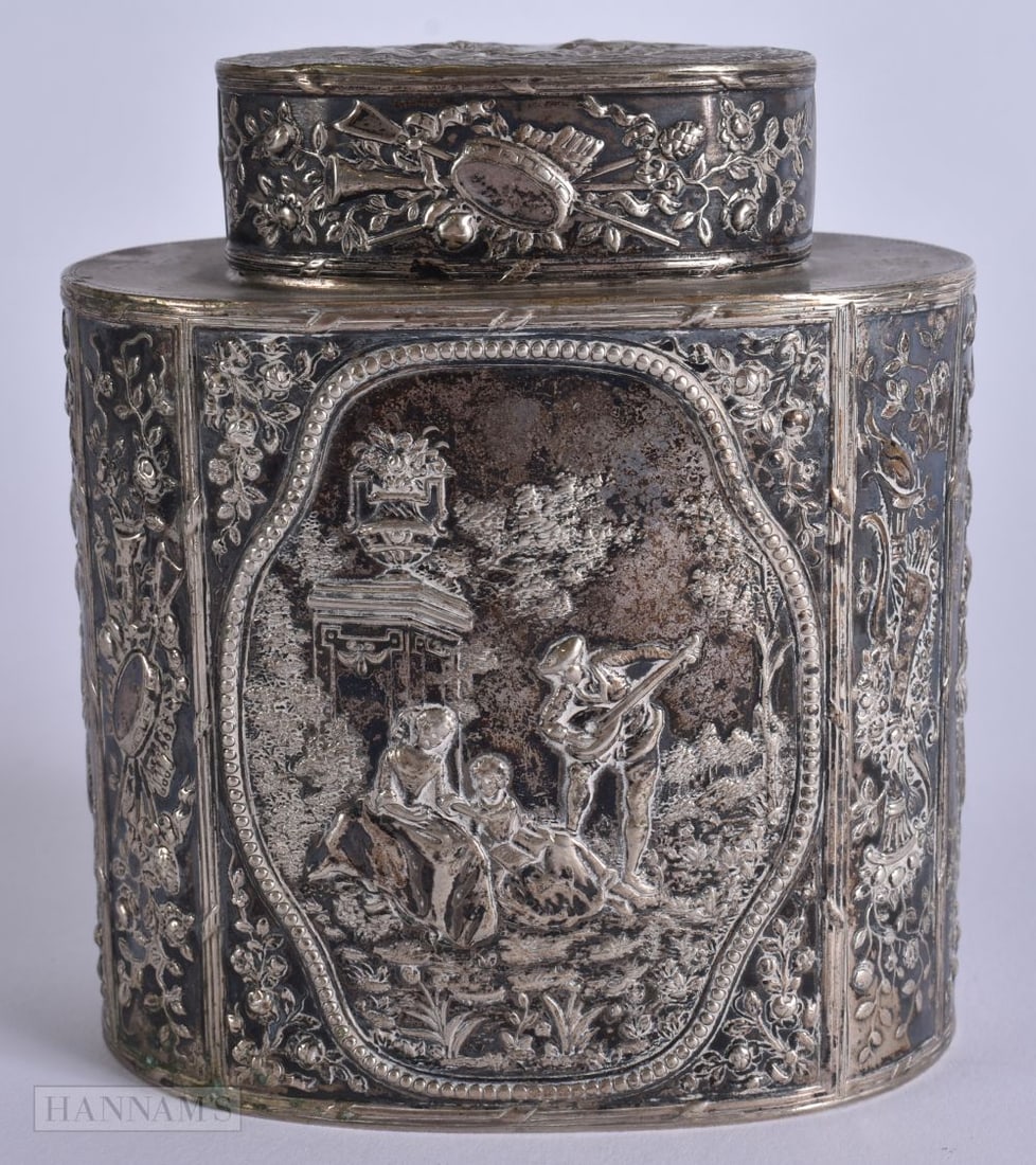 A FINE 19TH CENTURY CONTINENTAL SILVER TEA CADDY decorated with figures playing music within landsca (1 of 5)