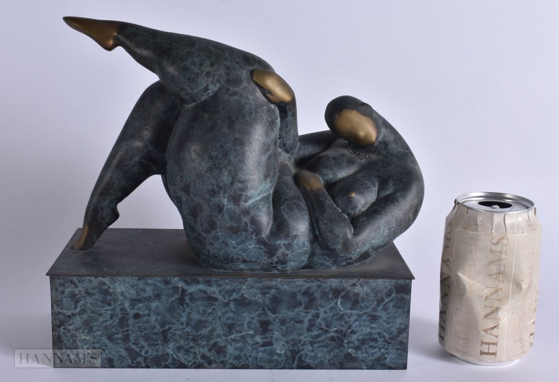 A BRONZE STUDY OF A STYLISED FEMALE. 24 cm x 26 cm.: A BRONZE STUDY OF A STYLISED FEMALE. 24 cm x 26 cm.