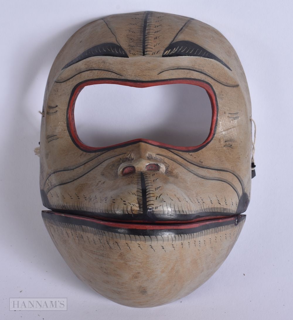 A 19TH CENTURY JAPANESE MEIJI PERIOD CARVED WOOD MASK formed as a monkey. 18 cm x 11 cm. (1 of 3)
