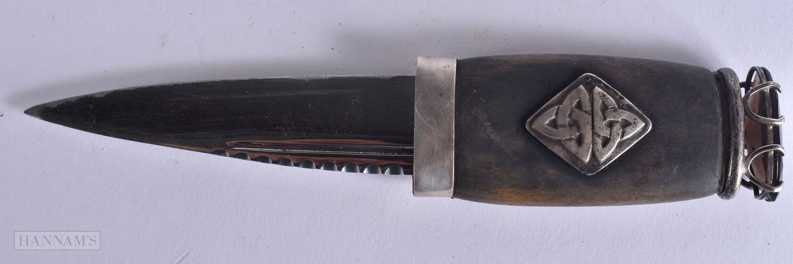 A SMALL SCOTTISH SILVER MOUNTED DAGGER. 18 cm long: A SMALL SCOTTISH SILVER MOUNTED DAGGER. 18 cm long