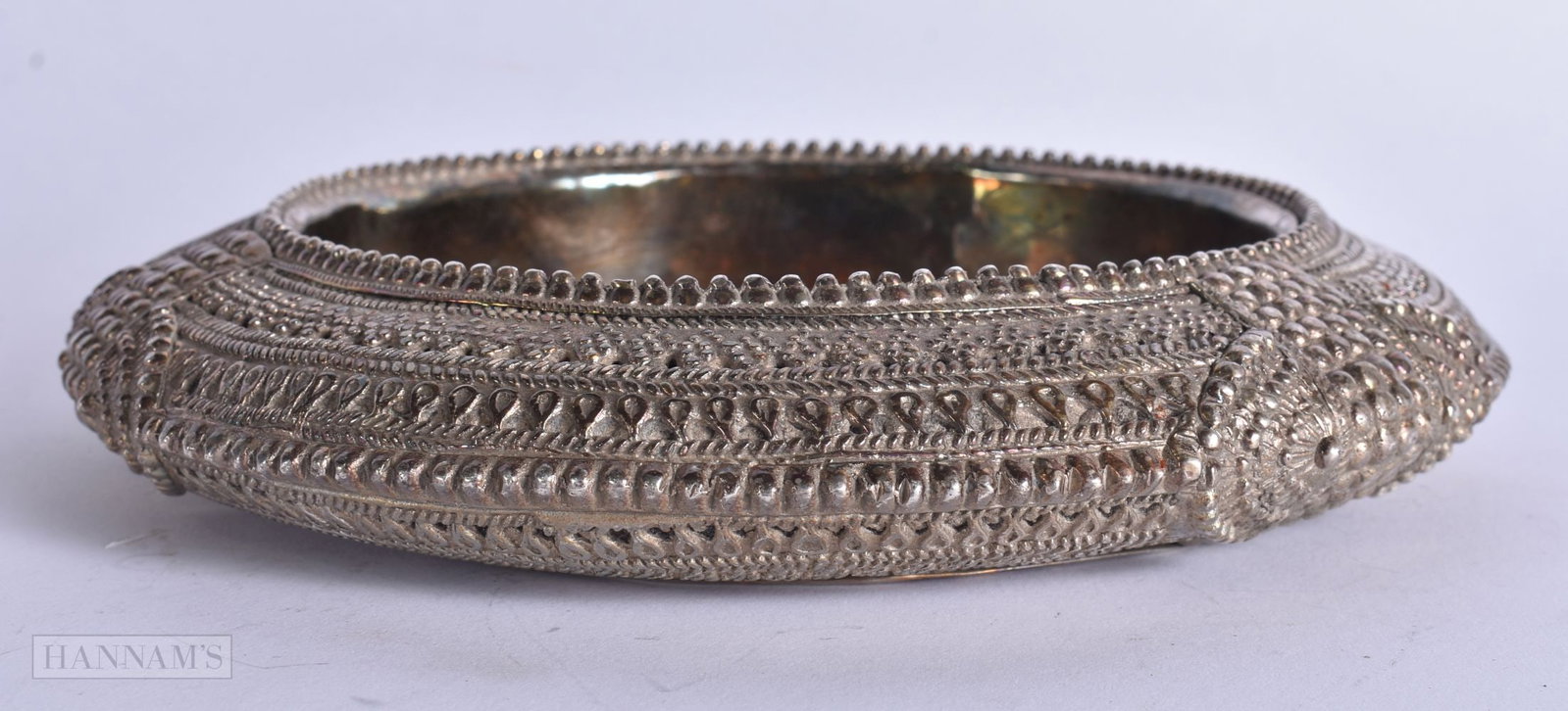 A BURMESE WHITE METAL BOWL. 737 grams. 20 cm wide. (1 of 4)