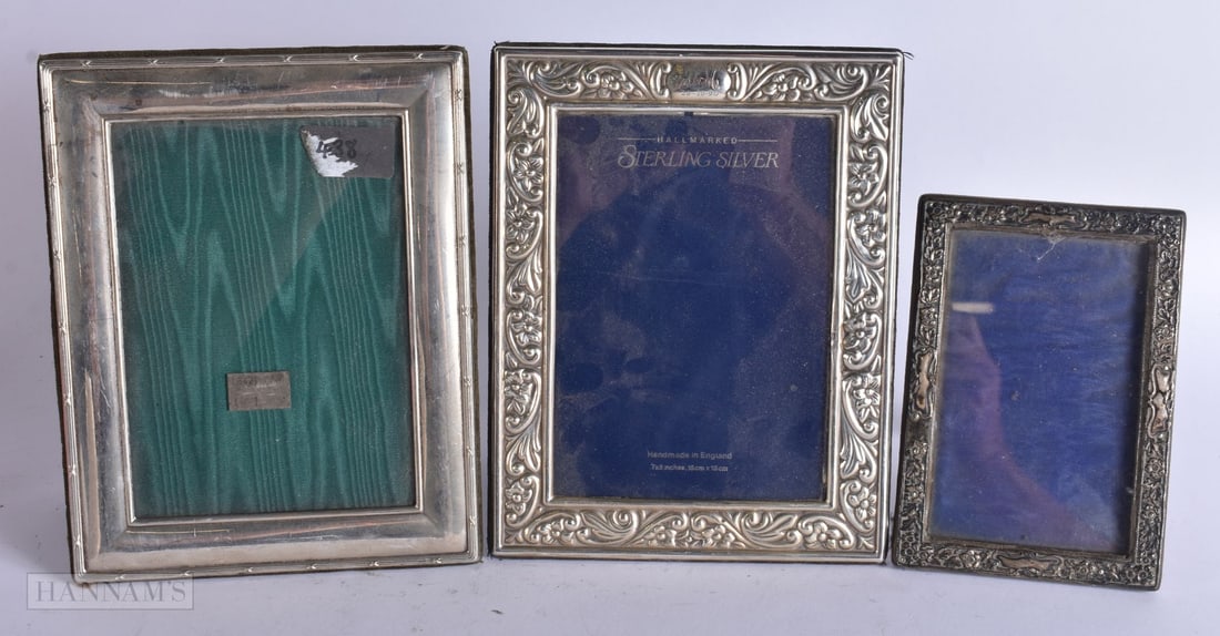 THREE SILVER PHOTOGRAPH FRAMES. Largest 22 cm x 19 cm. (3) (1 of 5)