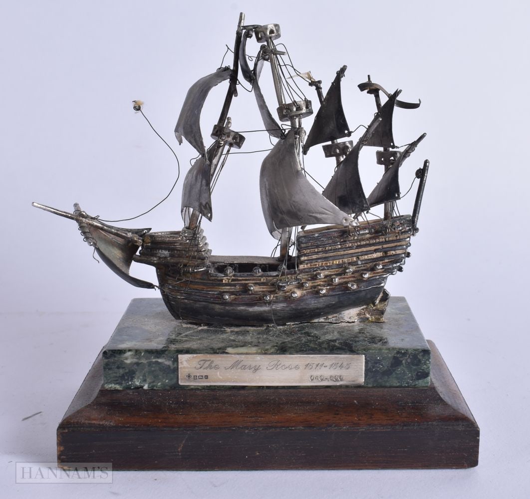 A SILVER MODEL OF THE MARY ROSE. 15 cm x 10 cm. (1 of 6)