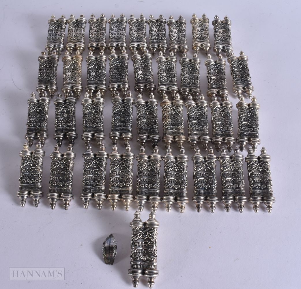 A LARGE COLLECTION OF JUDAIC SILVER TORAH PLACE HOLDERS. 500 grams. (qty): A LARGE COLLECTION OF JUDAIC SILVER TORAH PLACE HOLDERS. 500 grams. (qty)