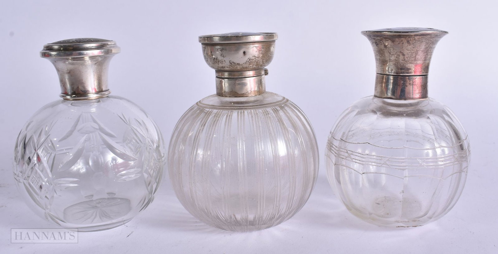 THREE ANTIQUE SILVER AND TORTOISESHELL SCENT BOTTLES. 11.5 cm high. (3) (1 of 6)